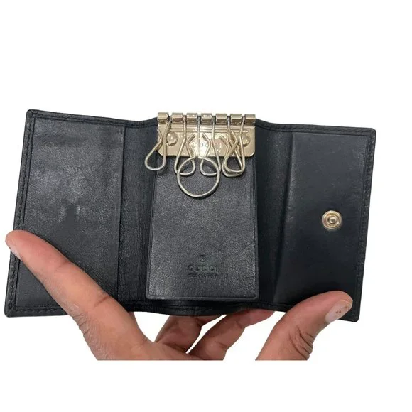 GUCCI: Black Monogram Guccissima Leather Key Case #1299